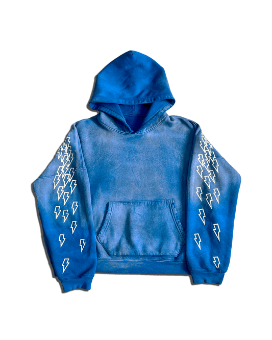 A blue Sunshine Reigns hoodie with lightning bolts screen printed on the arms